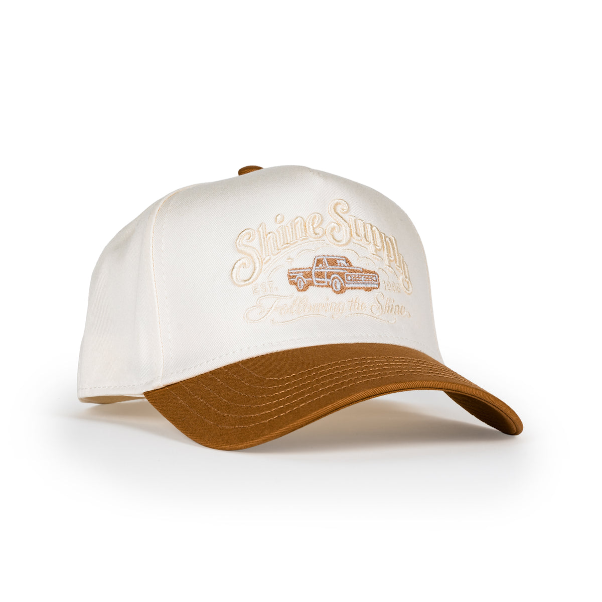 Tailgate snapback in cream with tan bill, embroidered vintage pickup and Shine Supply script